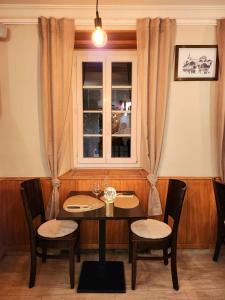 Posezení v ubytování Auberge de l’Union