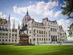 a large building with a statue in front of it at Luxe, Historic Home Downtown Landmarks 19 Century in Budapest