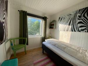 Postel nebo postele na pokoji v ubytování Villa Reipå - Northern lights and midnight sun