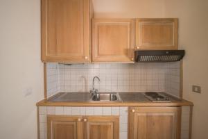 A kitchen or kitchenette at Il Giardino degli Oleandri