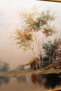 une peinture d'une maison sur le bord d'une rivière dans l'établissement Casa Rural ARIX, à Sallent de Gállego