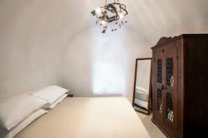 Ducato Wine Village客房内的一张或多张床位