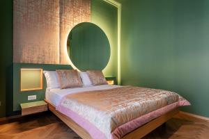 Postel nebo postele na pokoji v ubytování Le Texture Premium Rooms Duomo-Cordusio