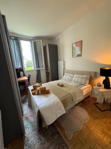 Postelja oz. postelje v sobi nastanitve Near Castle of Versailles Cozy room with Breakfast and Parking