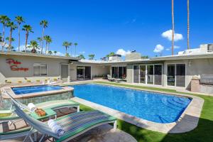 a house with a swimming pool and a house at Ultra-Luxury- Resort Style Private Compound-Close to Everything- 3BD/2.5BA in Palm Springs