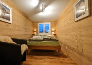 Imhof Alpine B&B Apartments客房内的一张或多张床位