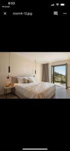 Ένα ή περισσότερα κρεβάτια σε δωμάτιο στο Sofibel sivota suites