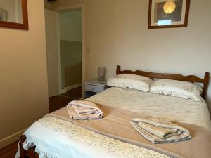 Cama ou camas em um quarto em Formby Point