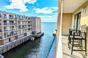 a balcony of a hotel with a view of the water at Wight Bay North #439 in Ocean City