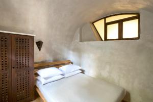 Ducato Wine Village客房内的一张或多张床位