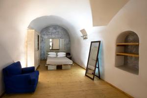 Ducato Wine Village客房内的一张或多张床位