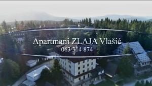 a sign that reads apartment zala vista village at Apartman 1 Zlaja Vlašić in Vlasic