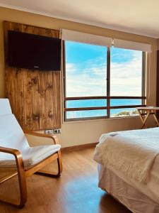 TV a/nebo společenská místnost v ubytování Blumen Hotel + 37 fotografií