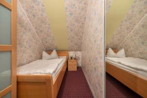 Postel nebo postele na pokoji v ubytování Großes Gästehaus