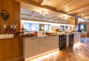 A kitchen or kitchenette at Hotel Panorama