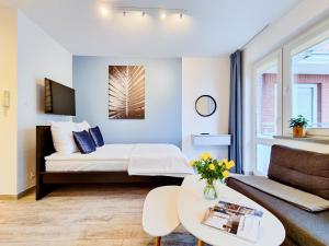 Posteľ alebo postele v izbe v ubytovaní Apartamenty Portowe Westerplatte 19