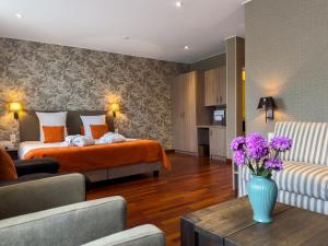 Voodi või voodid majutusasutuse Hotel Pavillon Du Zoute toas