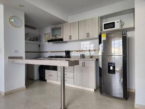Kuchyň nebo kuchyňský kout v ubytování Alojamiento, Penthouse, Dúplex, Jacuzzi