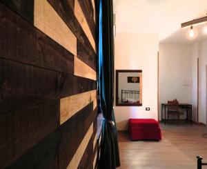 A bed or beds in a room at Camurria Sicilian B&B