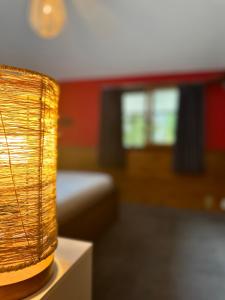 Postel nebo postele na pokoji v ubytování Moment Chalet Hakuba