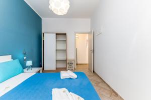 Posteľ alebo postele v izbe v ubytovaní Dimore Lucalorenzo