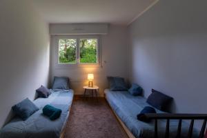 Posedenie v ubytovaní Appartement cosy, vue mer, terrasse et parking situé à Beaurivage