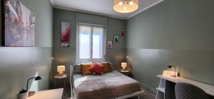 Ένα ή περισσότερα κρεβάτια σε δωμάτιο στο Sunshine House