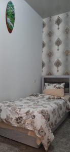 Postel nebo postele na pokoji v ubytování RUBENYAN GUEST HOUSE