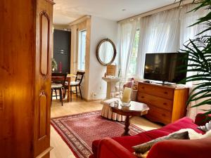 TV a/nebo společenská místnost v ubytování Romantic Space