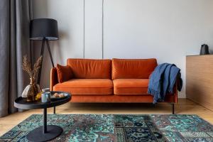 Posezení v ubytování Stylish loft with terrace Paupys, Old town