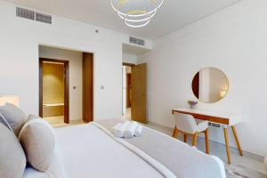 Postel nebo postele na pokoji v ubytování Residences 21 - Vacationer
