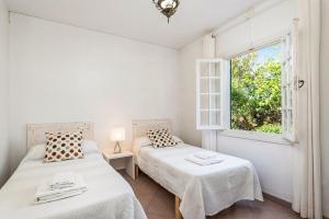 Postel nebo postele na pokoji v ubytování Casa Carlos - Villa en Son Cabrises