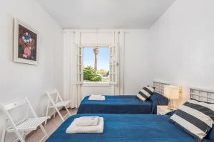 Postel nebo postele na pokoji v ubytování Casa Carlos - Villa en Son Cabrises