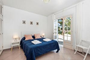 Tempat tidur dalam kamar di Casa Carlos - Villa en Son Cabrises
