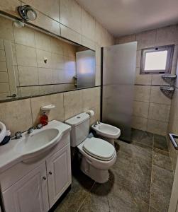 Koupelna v ubytování ARAUCARIA Resort + 36 fotografií