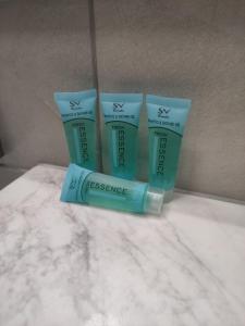 a group of three products sitting on a bathroom counter at Sea View Apartments Nikos in Nea Peramos