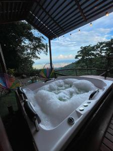 a bath tub filled with snow on top at Senderos Glamping in Villavicencio