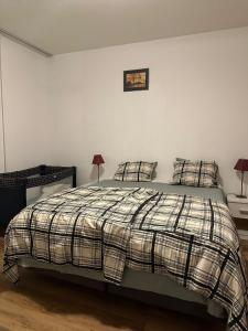 Postel nebo postele na pokoji v ubytování Star Family Apartments