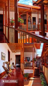 a large house with wooden floors and a staircase at Casa Patrimonial Abejorral - CASA GASAMA in Abejorral