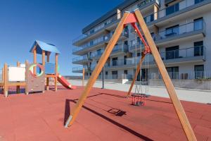 Herní místnost nebo prostor pro děti v ubytování Apartament NA WYDMIE Gardenia Dziwnów z widokiem na morze EPapartamenty