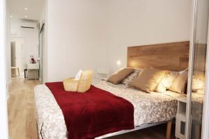 Cama o camas de una habitación en Hostal Gràcia