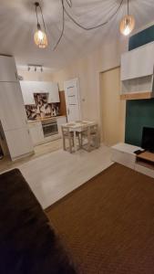 Kuchyňa alebo kuchynka v ubytovaní Apartament Poselska