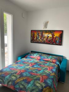 Tempat tidur dalam kamar di Villa Popilia Sea & Business Red