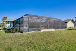 Ein Garten an der Unterkunft Punta Gorda Oasis with Saltwater Pool and Gas Grill!
