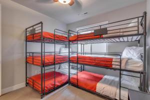 a bedroom with three bunk beds in a room at Paradise Village at Zion 28 Private Hot Tub, Outdoor firepit, and Community Pool in Santa Clara +87 photos