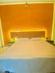 Postel nebo postele na pokoji v ubytování Rudra_HomeStay