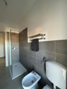 Koupelna v ubytování APPARTAMENTO PANORAMA + 19 fotografií