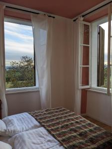 Postel nebo postele na pokoji v ubytování Castel San Mauro