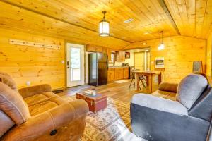 A seating area at Cozy Howard Cabin Hike, Hunt and Fish!