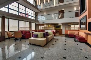 a lobby with couches and chairs in a building at Drury Inn & Suites Bowling Green in Bowling Green